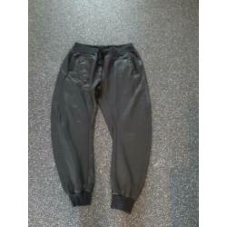 Zwart (licht ) glanzende broek mt xl